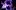 Angels in America Denise Gough as Harper and Andrew Garfield as Prior Angels in America with Denise Gough gesturing with her hand raised an dspeaking, and Andrew Garfield looking at her and listening with a pained expression on his face.