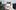 Bloomberg-Connects-National-Theatre-1200x675 An image of a hand holding a mobile phone with the Bloomberg Connects app open. The app is showing an exhibition titled 'Explore backstage'