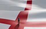 Dear-England-National Theatre-2000x2000 A lone figure stands, his back to us, wearing a waistcoat, shirt and trousers, in the centre of the red cross of the England flag that appears as a landscape rolling off into the distance.