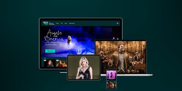A variety of devices including a desktop computer, laptop, tablet, and smartphone display different scenes from theatrical productions. The desktop shows 