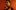 NTGDS_ES_THOBA_Website_Onsale assets_2000x1250 A woman with swept-back short, dark, wavy hair, looking stern and pointing at the viewer.