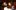 2018Stage-Manager-headsets-1280x720 Two people wearing headsets sitting backstage with a prompt script.