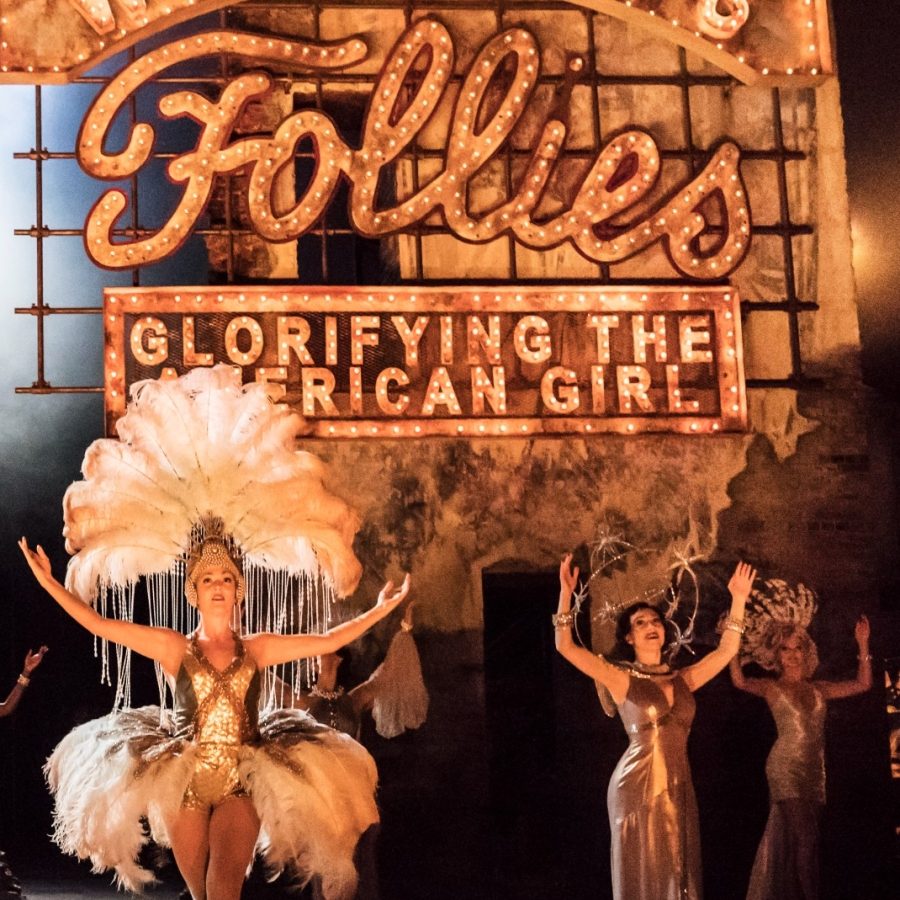The original cast of Follies The original cast of Follies, with dancers wearing bird feather-plumed head-dresses and skirts.